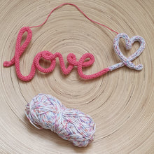 Load image into Gallery viewer, Knitted Words - &quot;love&quot; - Bright pink with Rainbow Fleck heart
